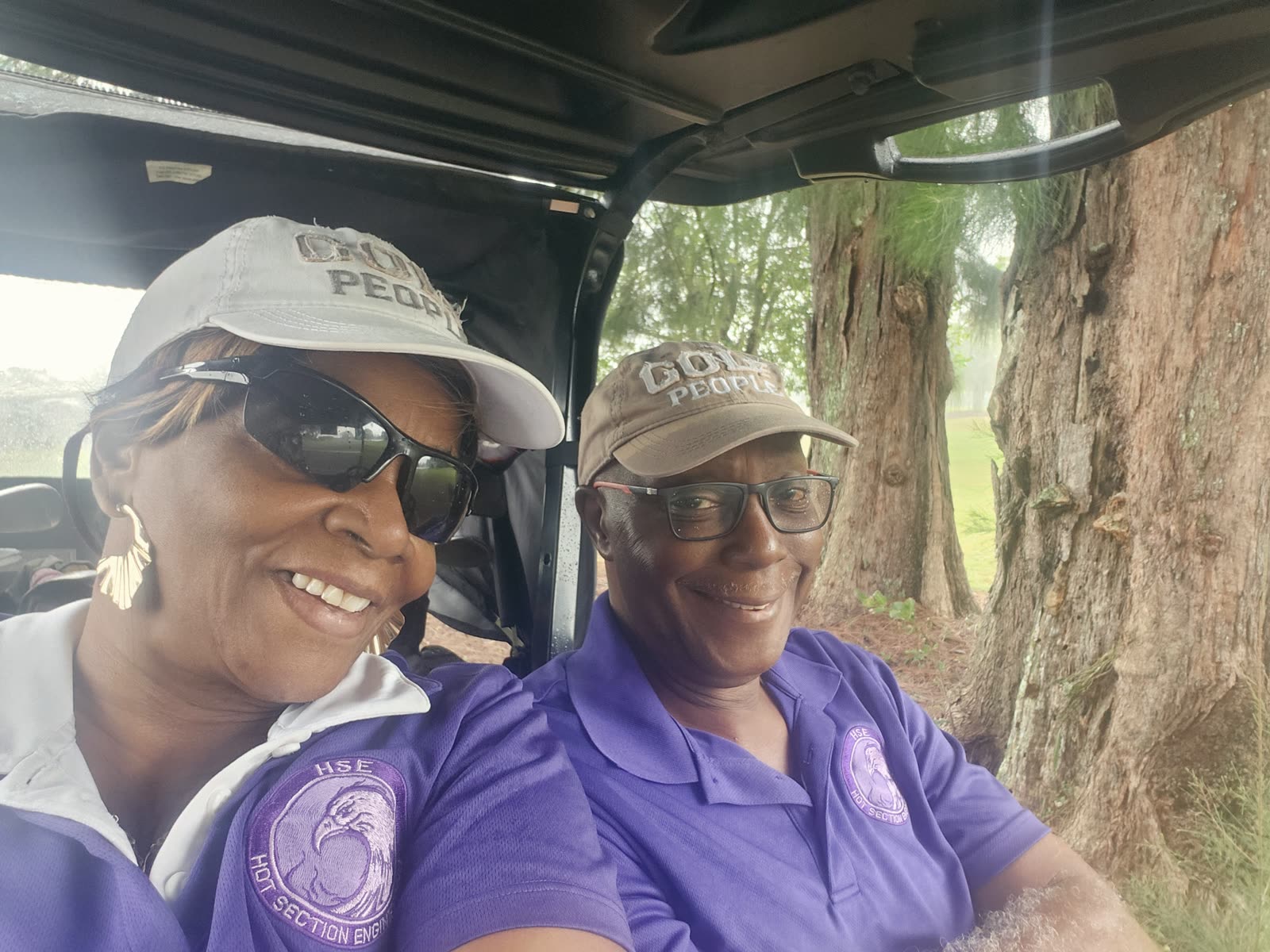 Bernard seated in a golf cart.